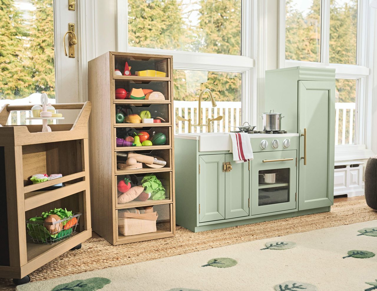 a play kitchen for kids in green color