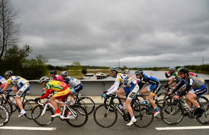 Riders pass over the River Shannon in Portumna during the second day at the An Post Ras in Ireland