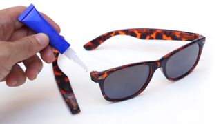 Using superglue to fix broken sunglasses