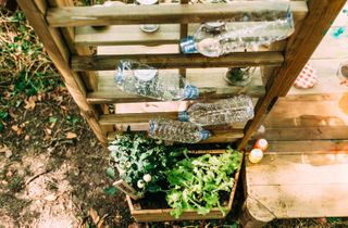 mud kitchen ideas: water bottles