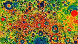 a map of the moon and its many craters, showing regions with more gravity in red and regions with less gravity in green and blue