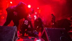 Security subdues a man who stabbed the mayor of Gdansk on stage in front of hundreds of people