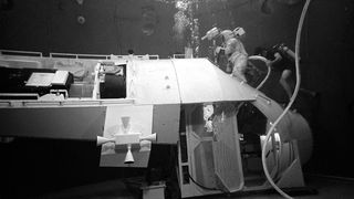 Thomas K. Mattingly II takes part in underwater training to simulate the conditions in space.