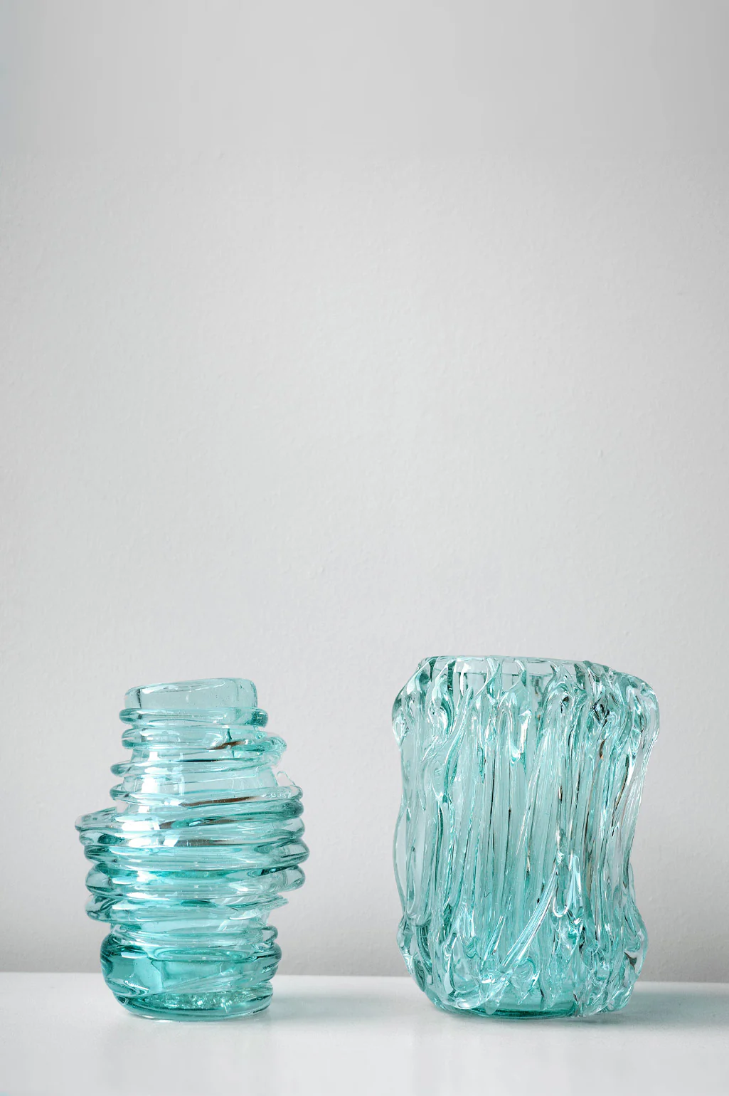 slumped glass blue green vessels