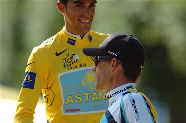 Lance Armstrong (Astana) congratulates Andy Schleck (Saxo Bank) as Alberto Contador looks on
