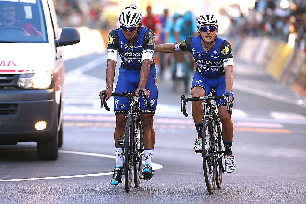 Gianluca Brambilla helps Fernando Gaviria after his Milan-Sanremo crash