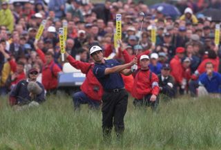 Jean Van De Velde hits his shot at the 1999 Open Championship