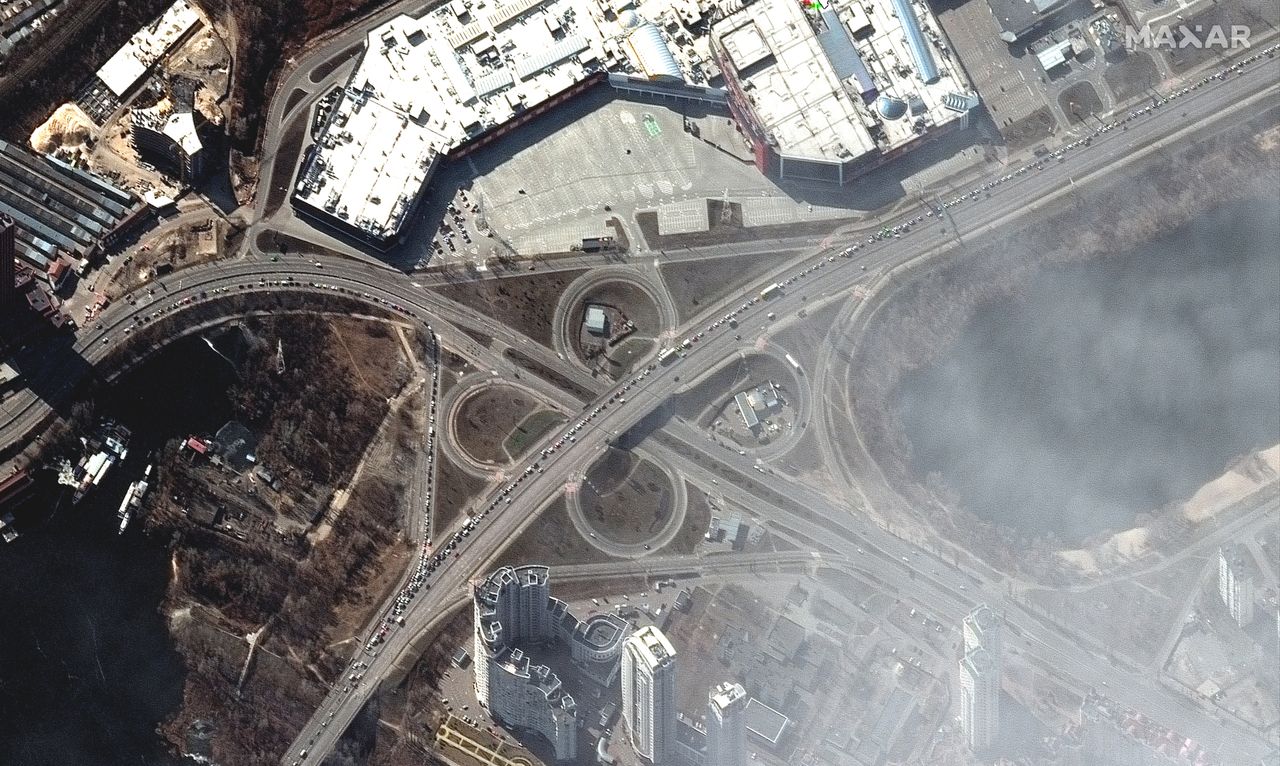 People and long line of cars trying to leave Kyiv, Ukraine on March 11, 2022 as seen by the WorldView-2 satellite for Maxar Technologies.