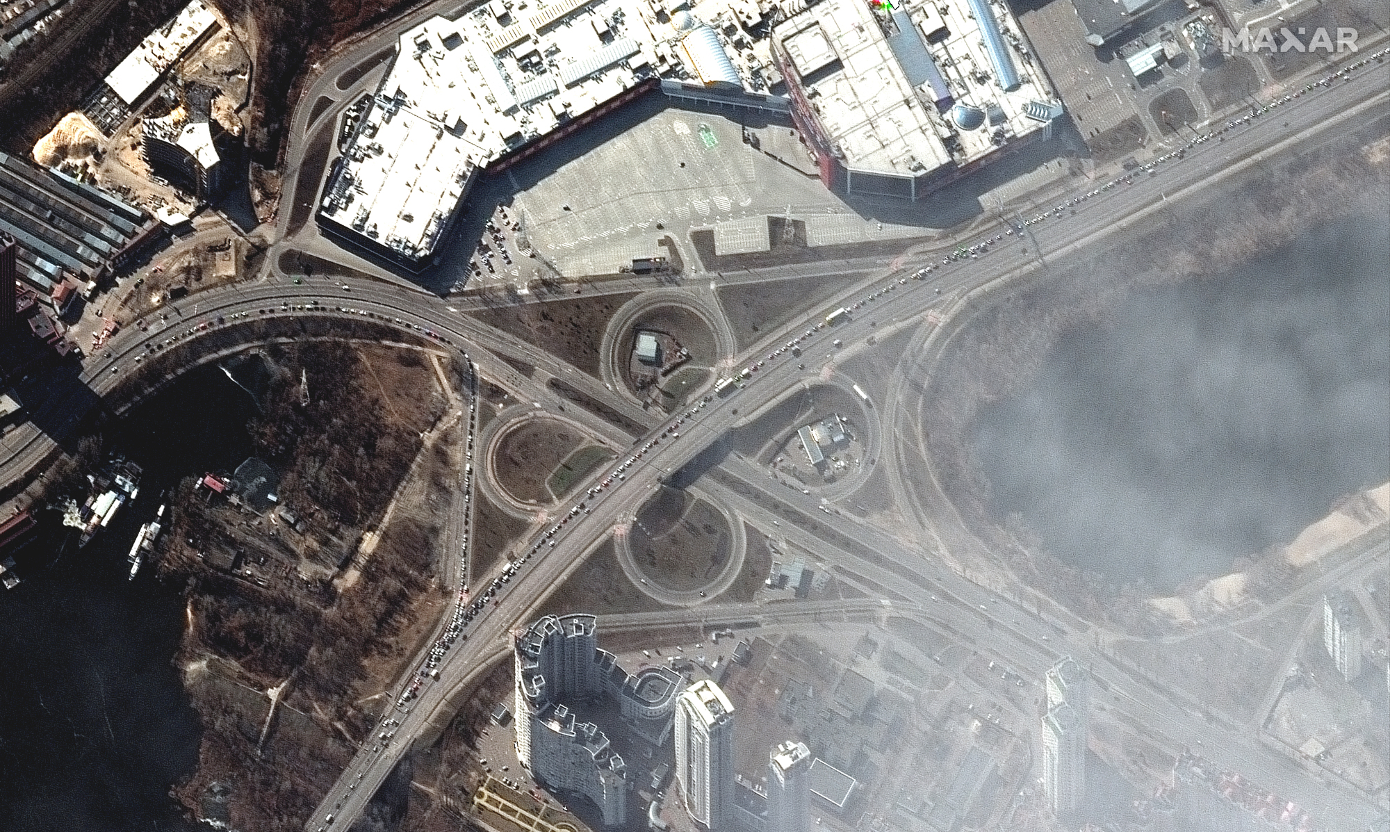 People and long line of cars trying to leave Kyiv, Ukraine on March 11, 2022 as seen by the WorldView-2 satellite for Maxar Technologies.