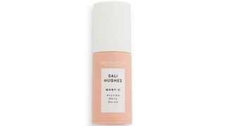 The best drugstore vitamin c seurm our beauty team tried, Sali Hughes X Revoilution Must-C Daily serum in a pastel orange bottle with a white lid