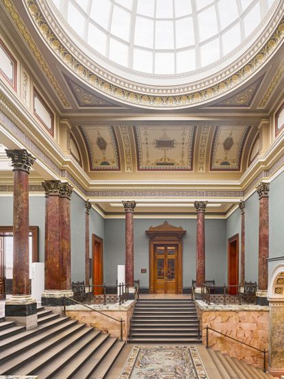The entrance hall. Note the figurative floor, 1928&ndash;33, by Boris Anrep. The National Gallery, London. &copy;Will Pryce for Country Life