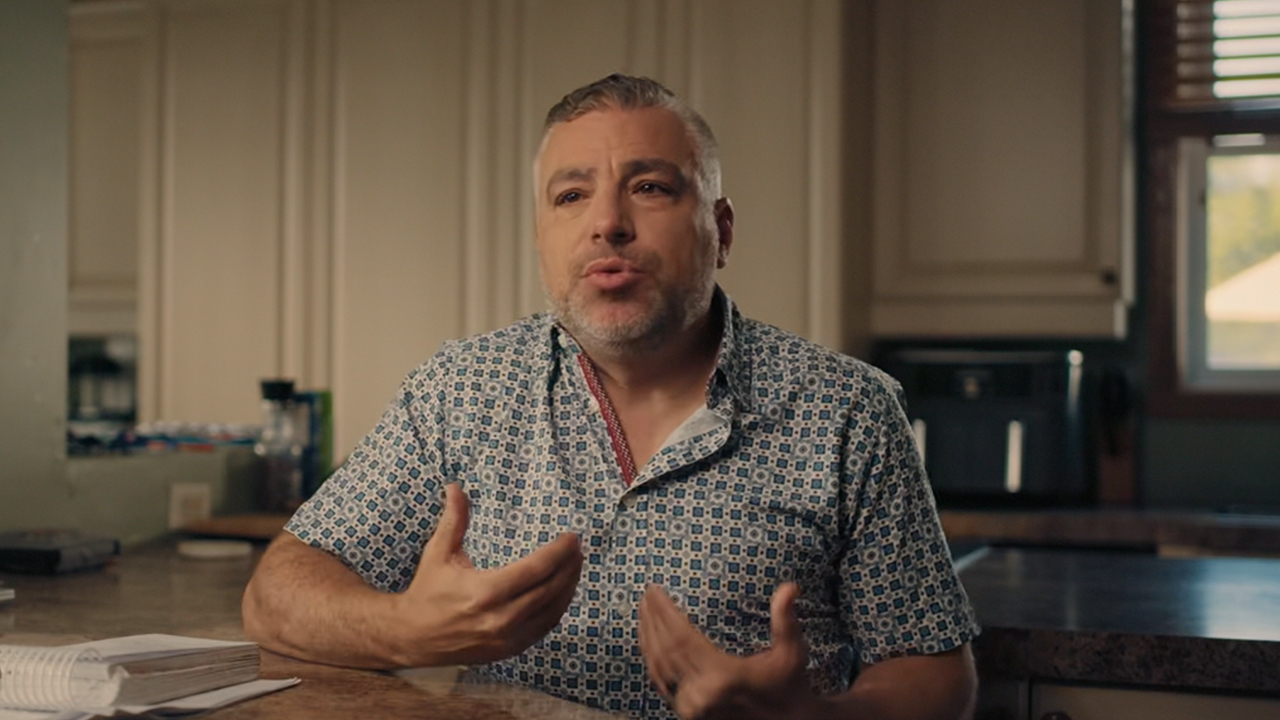 A frustrated Montreal Expos fan being interviewed in his kitchen.