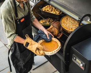 person cooking a wide range of food on a pellet grill