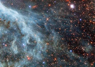 A Hubble Space Telescope view of the Large Magellanic Cloud (the blue clouds on the left).