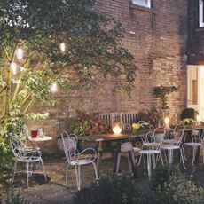 Home of lighting designer Sally Stone. Garden lighting