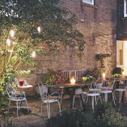 Home of lighting designer Sally Stone. Garden lighting