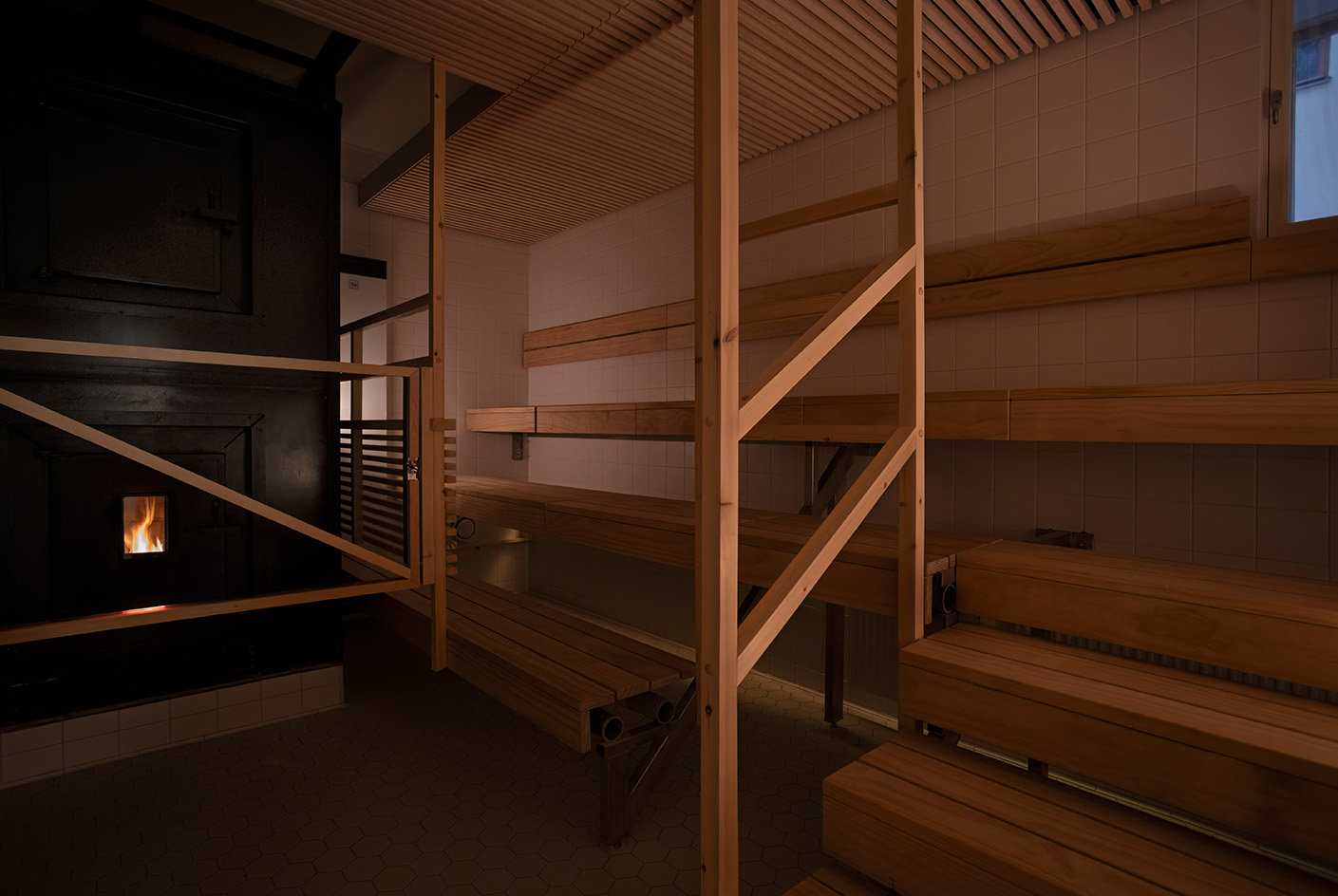 interior vista of Yrj&amp;ouml;nkatu, the indoors Helsinki swimming hall with its tall ceilings, art deco detailing and pool in the middle