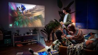 Samsung's The Freestyle Gen 2 projecting an image of Sonic the Hedgehog in a living room.