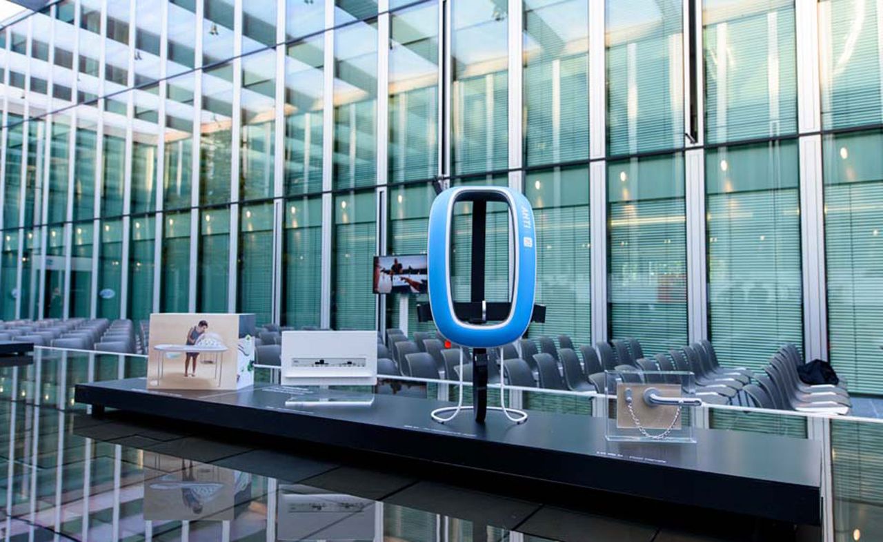 Braun prize 2015, a desk featuring examples of designers work, in an office setting with a window wall.