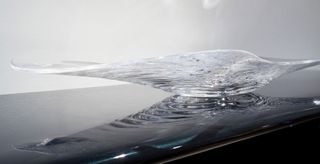 The collection, like previously, resembles flowing ice and motioning water streams through Hadid’s acrylic moulding