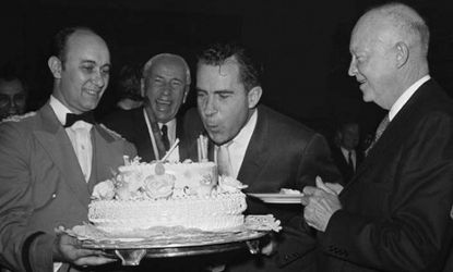 Richard Nixon blows out the candles on his 48th birthday: Jan. 9, 1961.