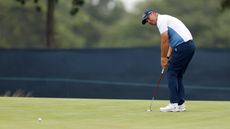 Padraig Harrington hits a putt