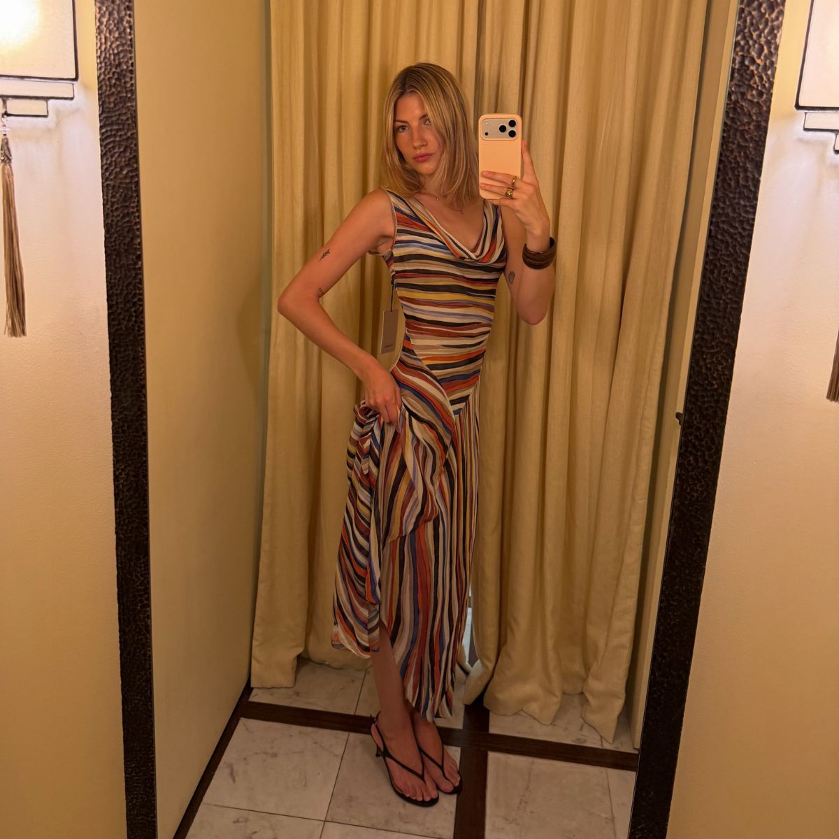 An image of @hopemarsh trying on the Realisation Par Cora dress.