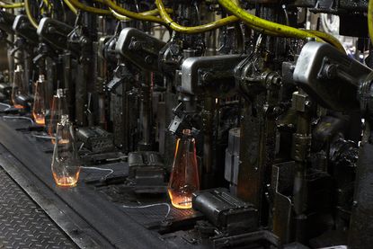 Mathmos Lava Lamp factory in Poole, glass bottles on production line