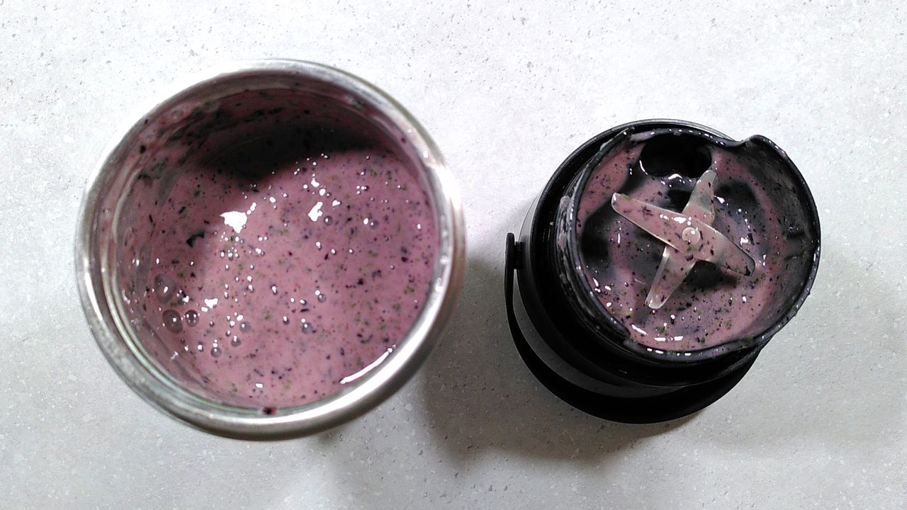 Nutribullet Flip blender containing fully blended smoothie