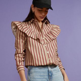 red and beige striped shirt with large frill across front and over shoulder, composite shown on model and as a cut out 