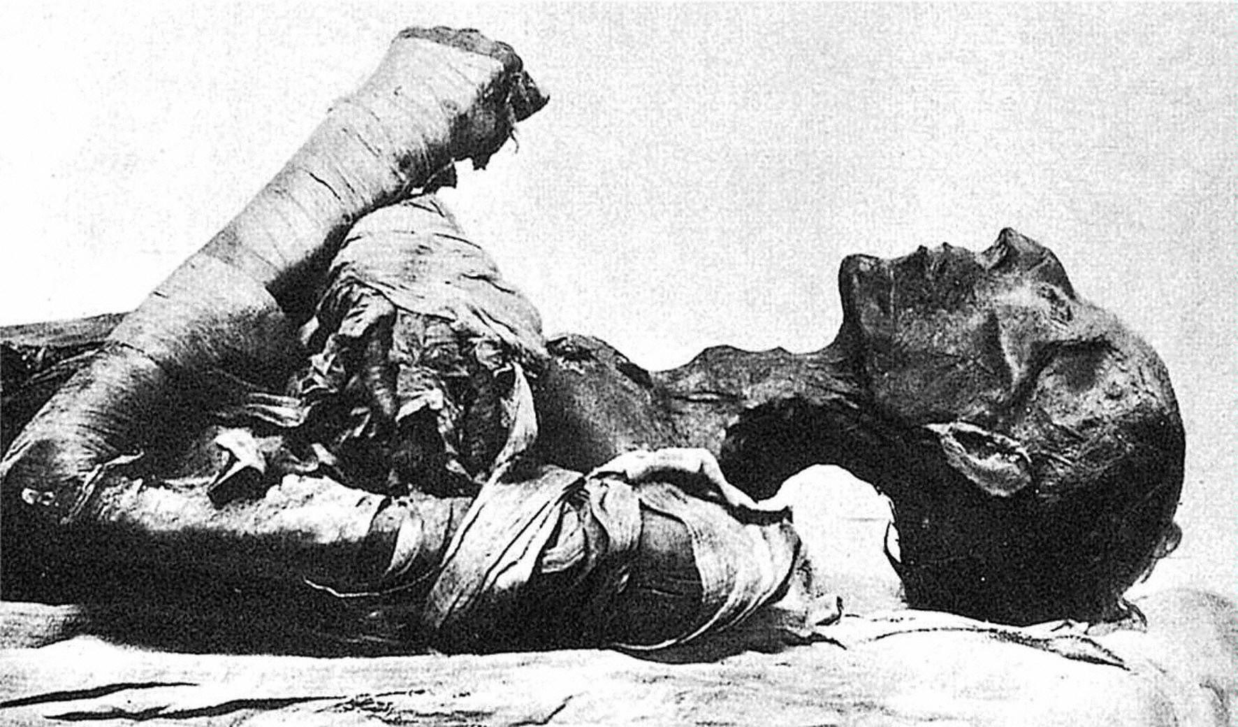 A black and white photo of the mummy of Pharaoh Ramses II.