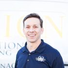 A headshot of David Lewis