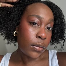 Editor applying summer glow makeup routine