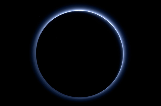 Back-lit, Blue-skied Pluto