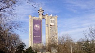 Western City Gate in Belgrade, Serbia, is formed by two towers connected with a two-storey bridge and revolving restaurant at the top