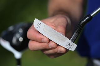 Jacquelin's putter features both his logo and that of its creator, ValGrine
