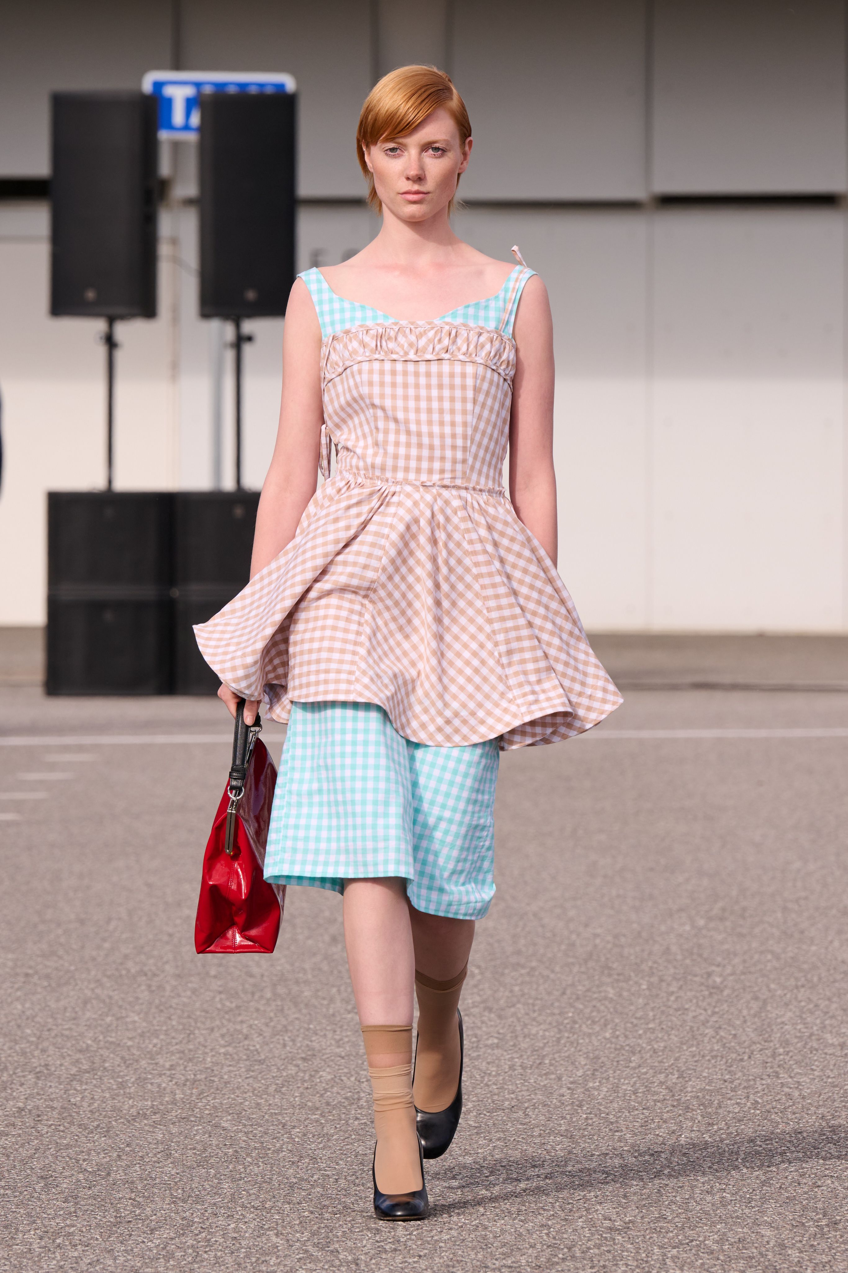 Four Spring 2027 Copenhagen Fashion Week looks featuring colorful woven skirts, white separates, layered gingham, and relaxed tailoring from Larkin, Skall Studio, and Nicklas Skovgaard.