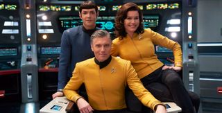 CBS All Access has greenlit a new "Star Trek" spinoff series with Captain Pike (Anson Mount, center), Spock (Ethan Peck) and Number One (Rebecca Romijn). 