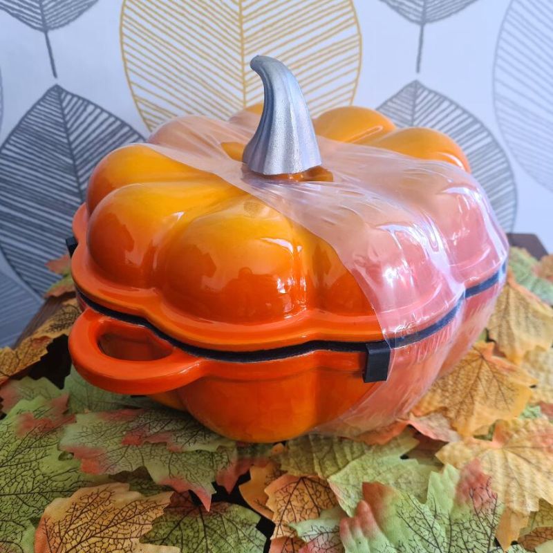 An orange Etsy Cast Iron Pumpkin Halloween Casserole Dish is a cheaper alternative to the Le Creuset Cast Iron Pumpkin Casserole.