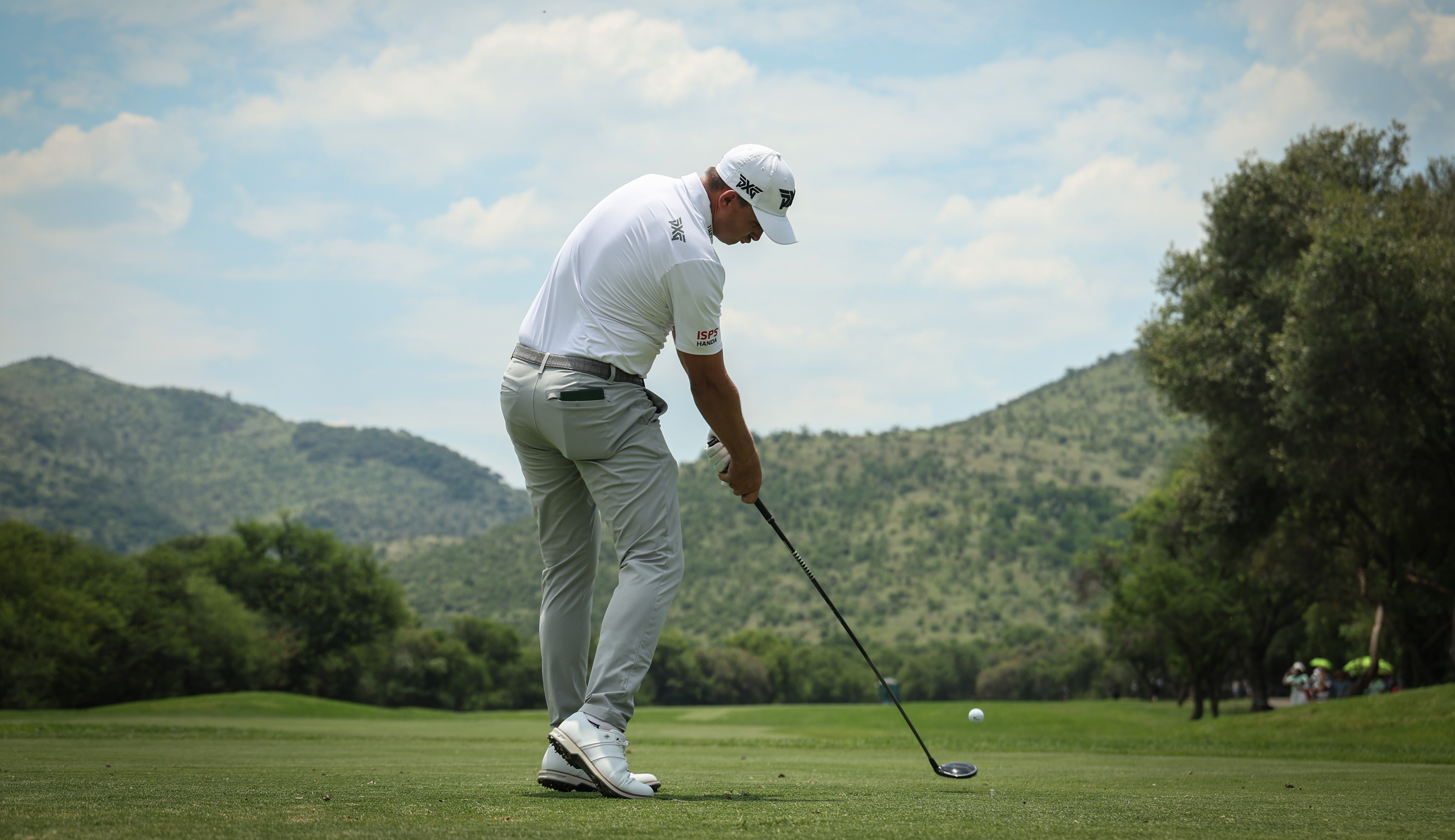 Christiaan Bezuidenhout hits a fairway wood