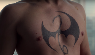 dragon chest tattoo on Iron Fist