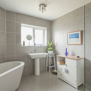 smock tower mill bathroom with grey tiles wall