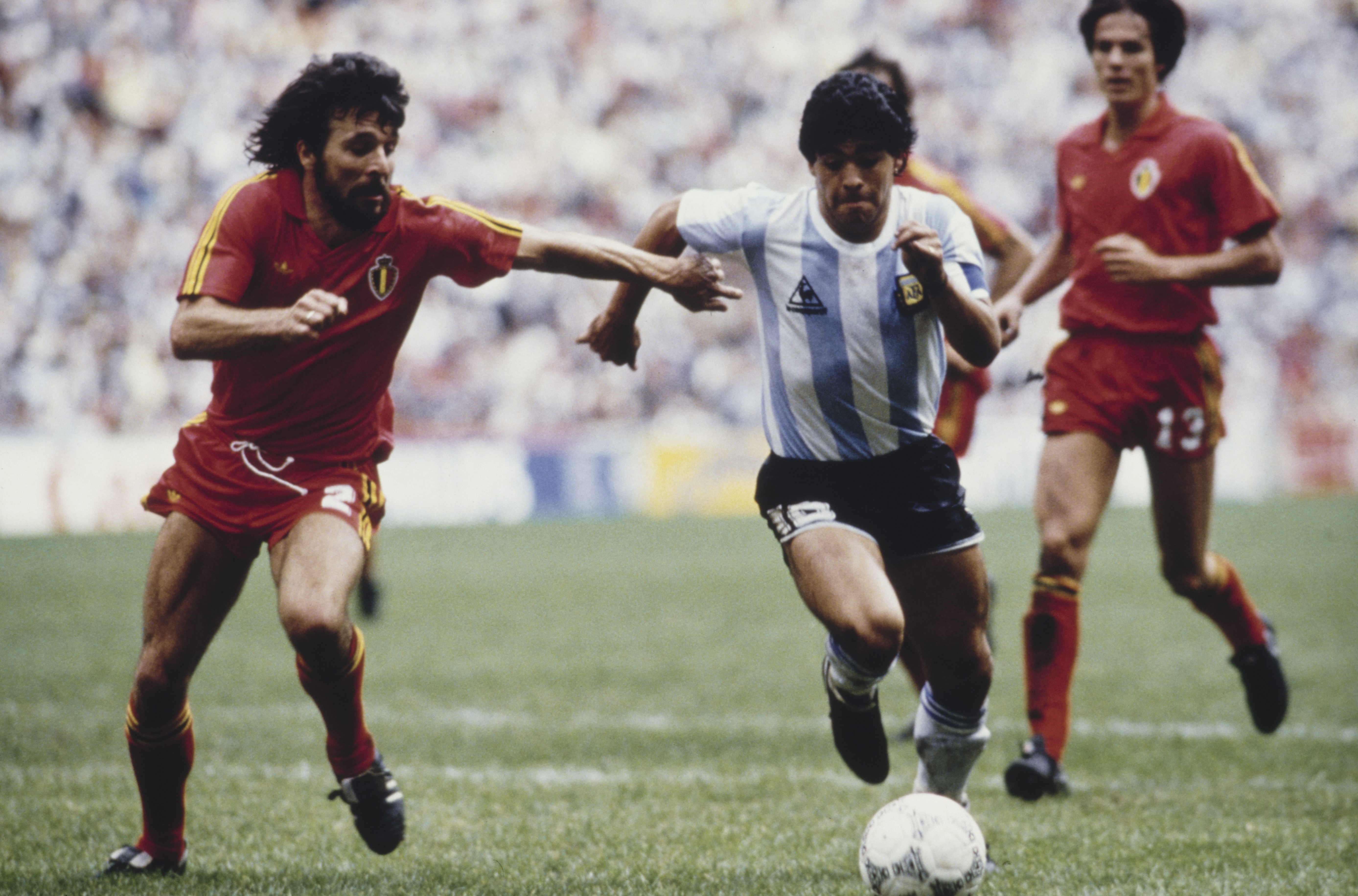 Diego Maradona on the ball for Argentina against Belgium in the 1986 World Cup semi-finals.