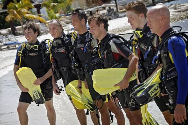 The pasty white chests of the riders thankfully covered in scuba gear