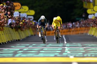 LELIORAN FRANCE JULY 10 LR Jonas Vingegaard Hansen of Denmark and Team Visma Lease a Bike and Tadej Pogacar of Slovenia and UAE Team Emirates Yellow Leader Jersey sprint at finish line to win the stage during the 111th Tour de France 2024 Stage 11 a 211km stage from EvauxlesBains to Le Lioran 1239m UCIWT on July 10 2024 in Le Lioran France Photo by Dario BelingheriGetty Images