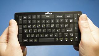A thumb keyboard serves as the remote.