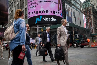 People walking outside the New York Stock Exchange.