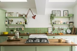 white walls and apple green kitchen cabinets