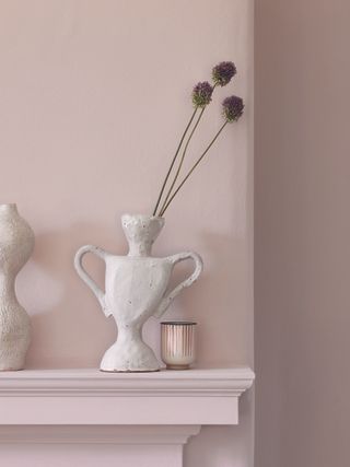 Pink walls and fireplace by Dulux