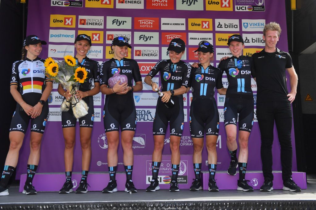 HALDEN NORWAY AUGUST 14 Lea Curinier of France Megan Jastrab of United States Leah Kirchmann of Canada Floortje Mackaij of Netherlands Esmee Peperkamp of Netherlands Liane Lippert of Germany and Team DSM celebrates at podium as best team prize winner during the 8th Tour of Scandinavia 2022 Battle Of The North Stage 6 a 1543km stage from Lillestrm to Halden UCIWWT tourofscandinavia TOSC22 on August 14 2022 in Halden Norway Photo by Luc ClaessenGetty Images
